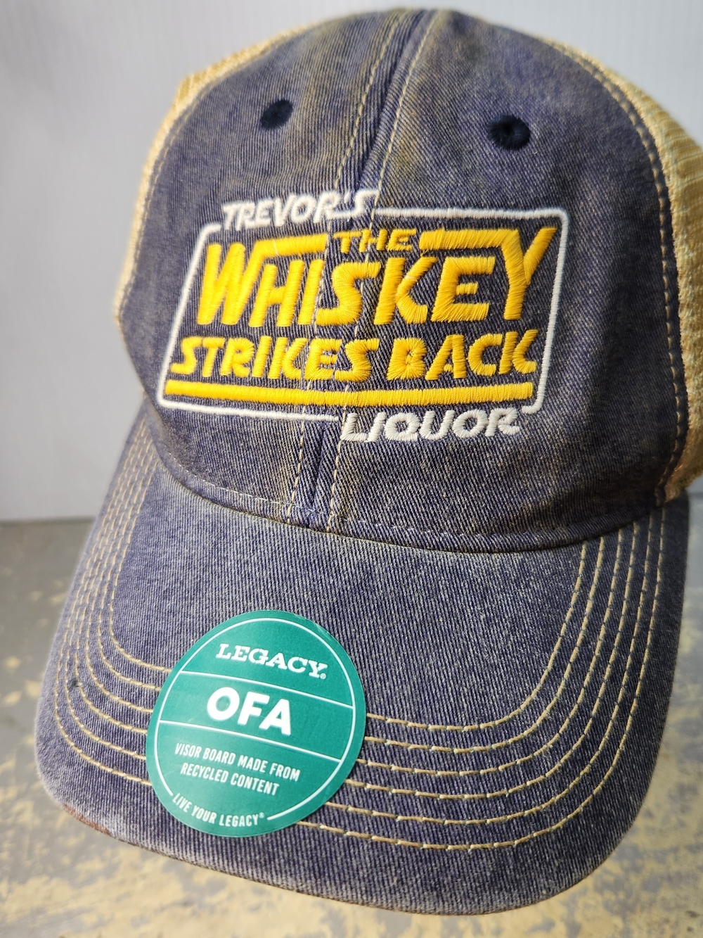 The Whiskey Strikes Back Embroidered Trucker Hat - Navy & Tan Distrested